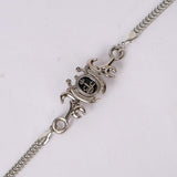 Elegant Silver-Tone Emblem Bracelet